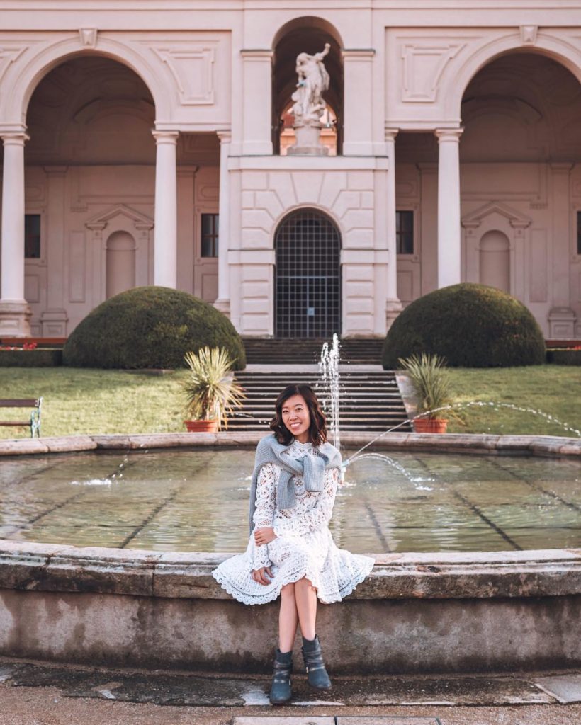 photo of girl in front of Cernisky Palace Gardens in prague