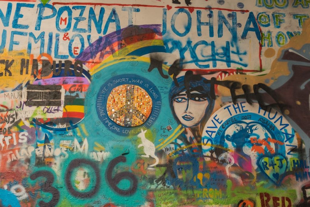 photo of the lennon wall artwork in prague