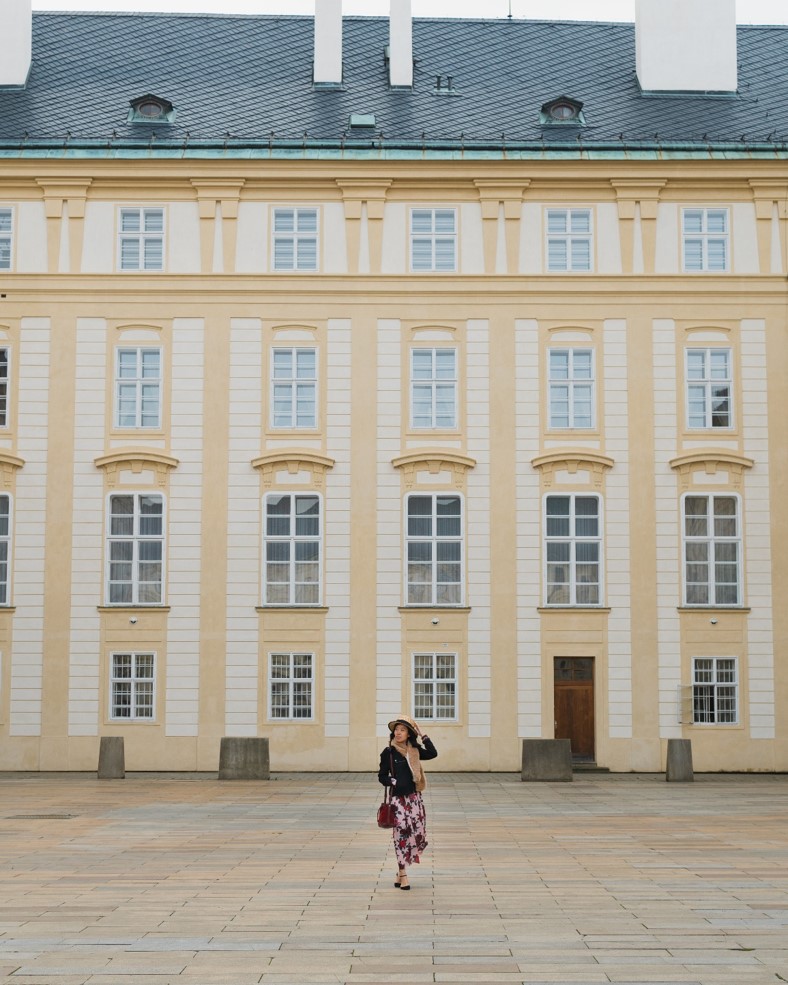 girl in courtyard near Prague Castle