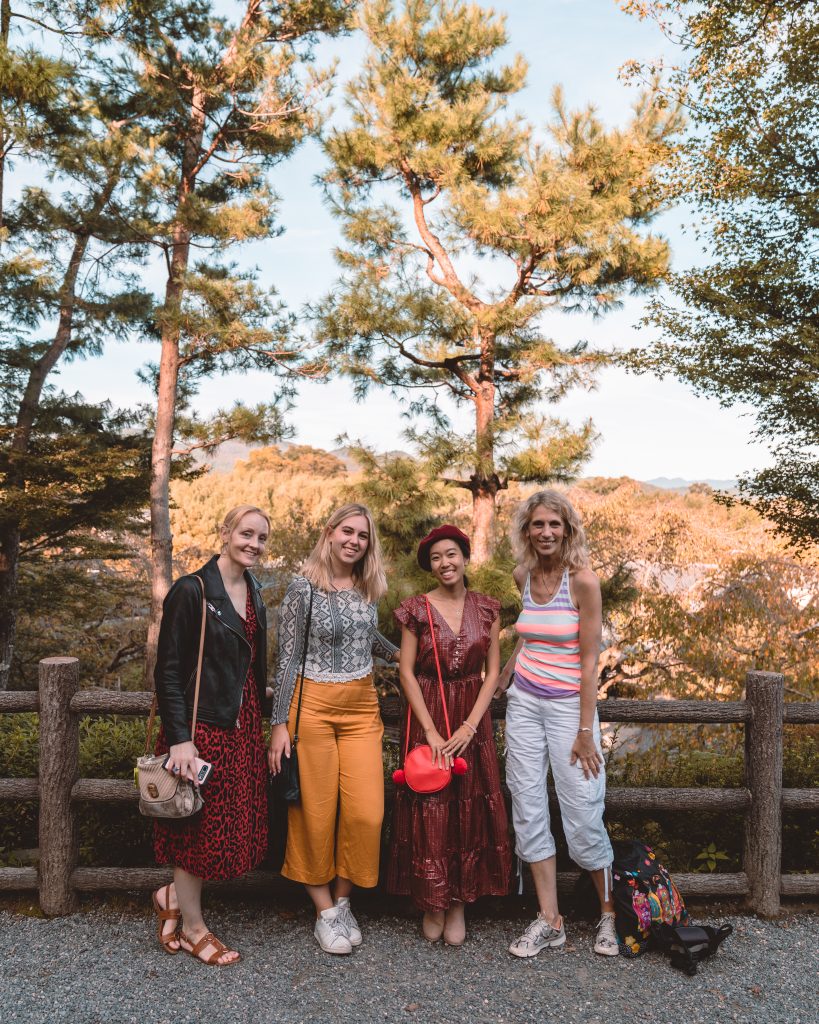 women smiling in Kyoto temple