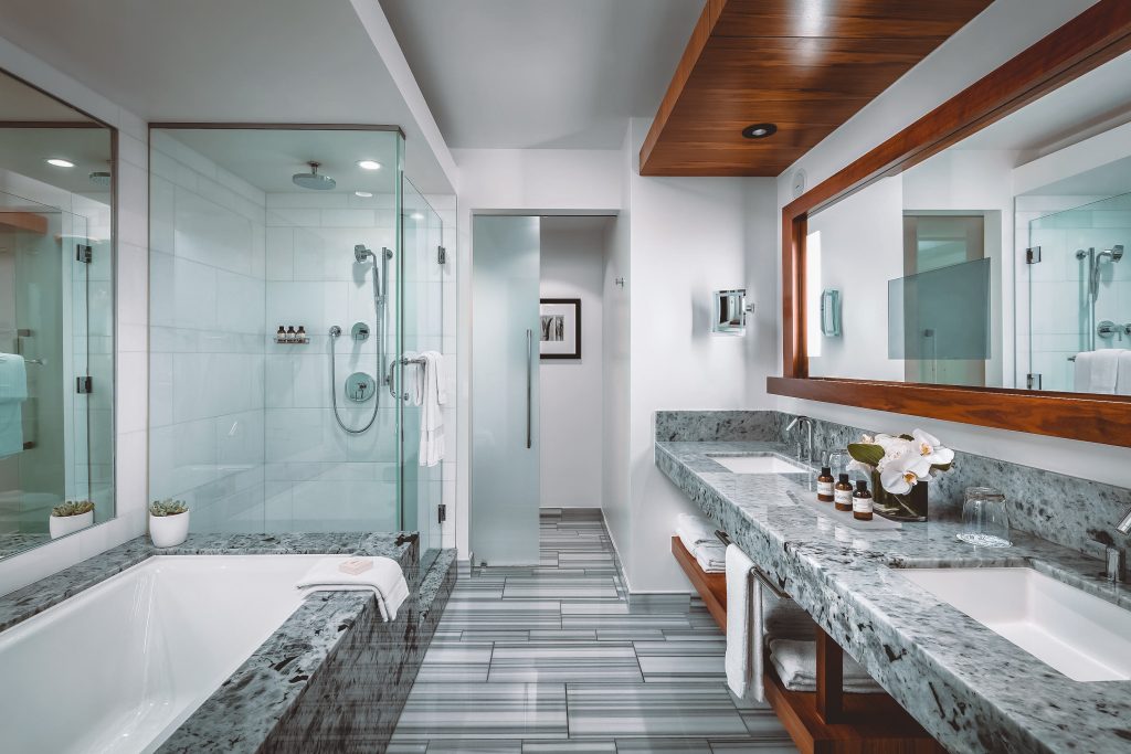 Large marble bathroom with tub