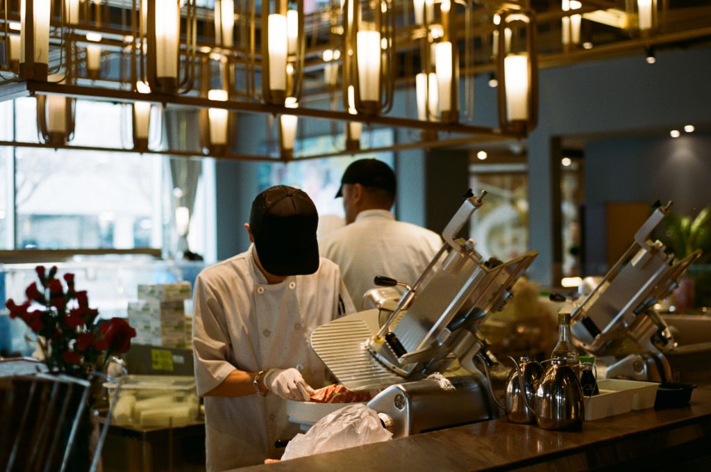 kodak colorplus 200 image of chef cutting meat