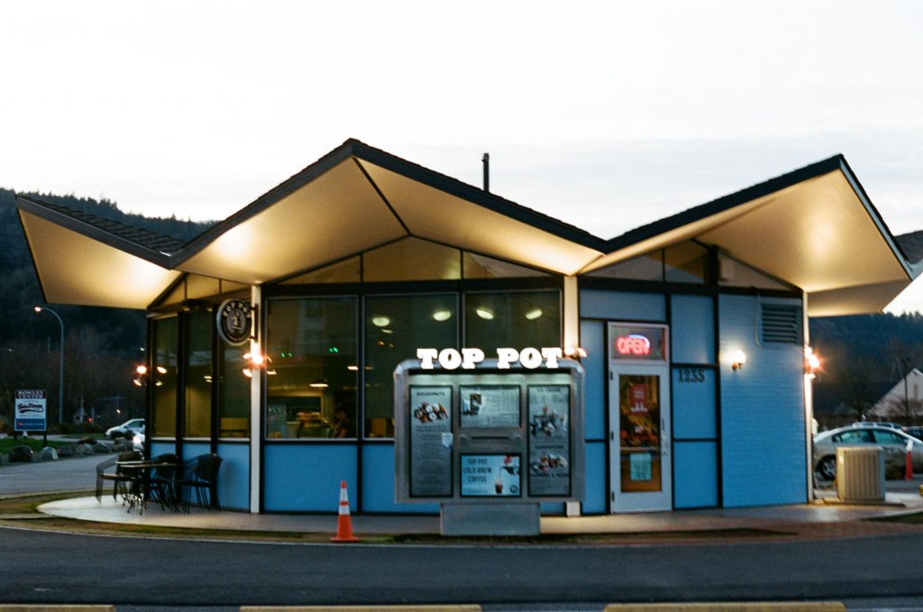 image of a donut shop at night