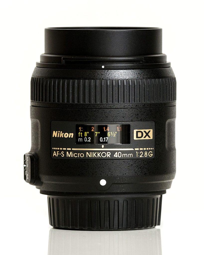 image of 40mm f2.8 in front of white background