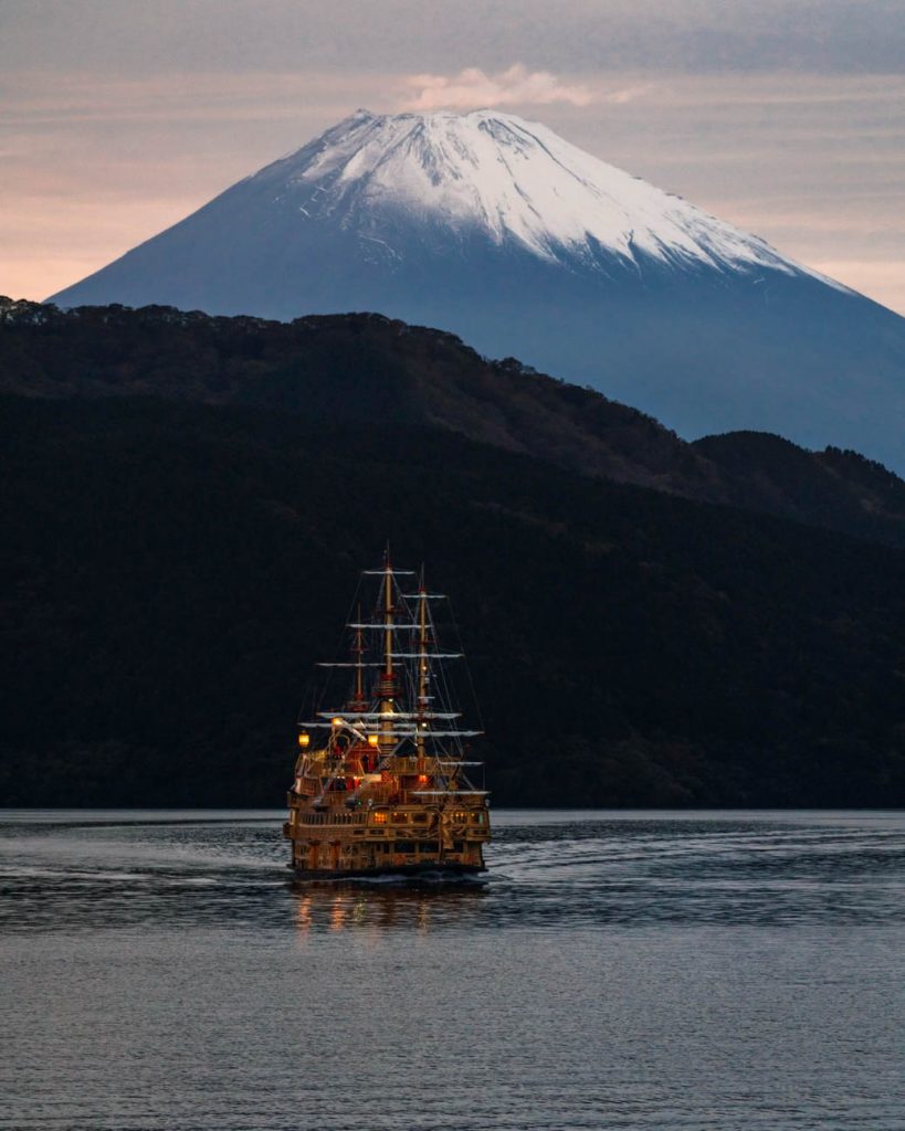 image of a pirate ship on lake in front of mount fuji