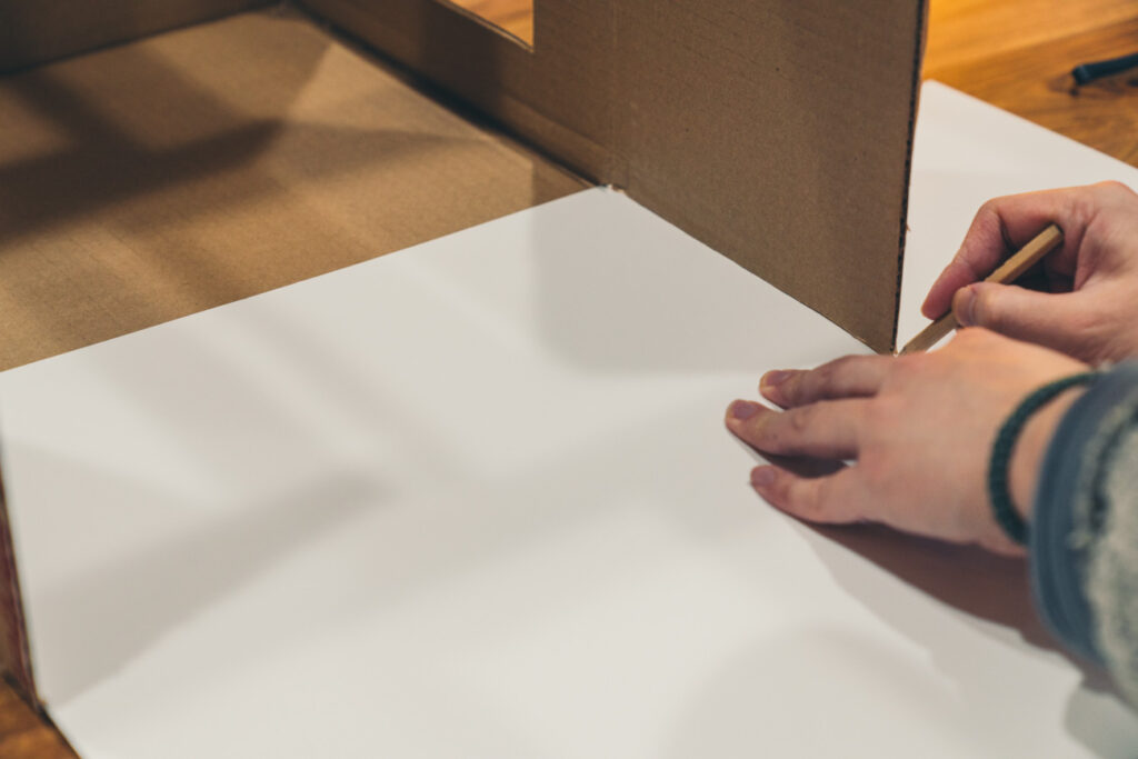 image of measuring length of a poster board