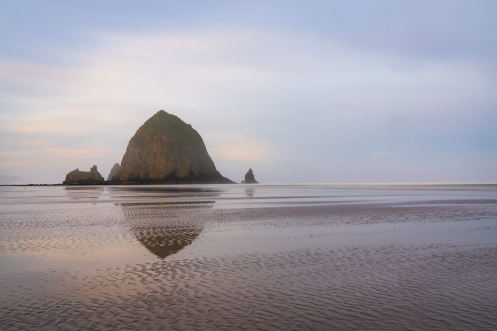 image of cannon beach haystack at sunrise