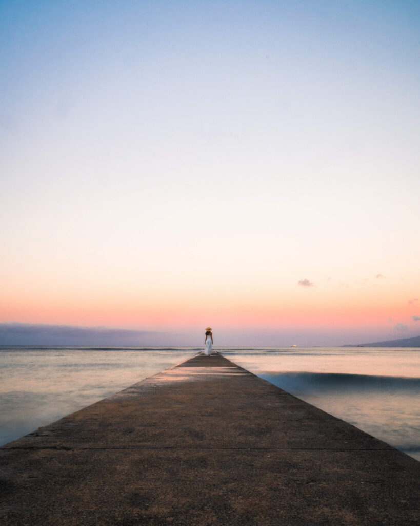 image of girl on pier shot with long exposure